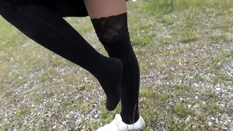 Schoolgirl In Black Knee Socks And White...